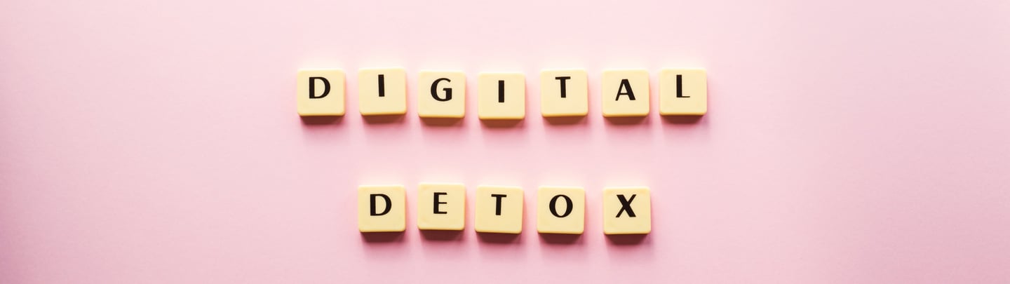 a pink background with the words digital detox