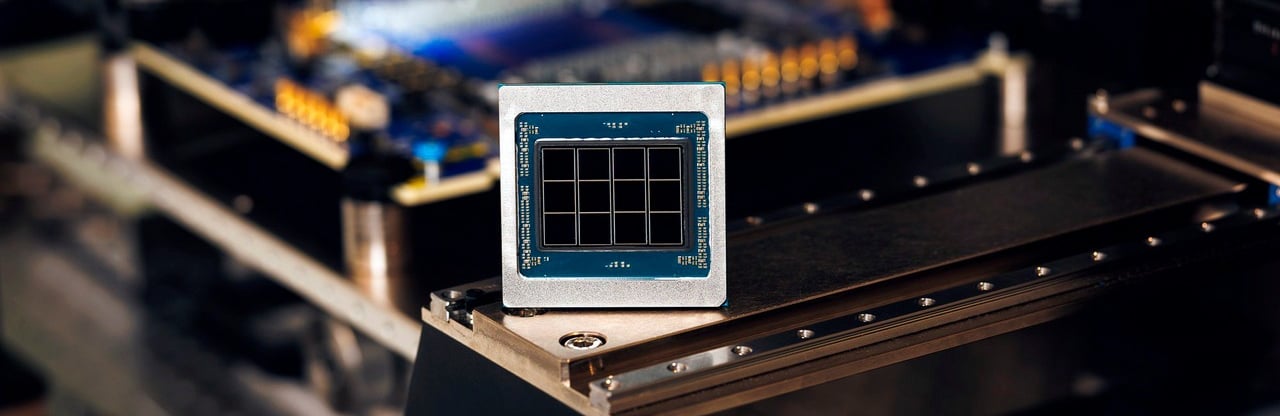 Close-up of a high-performance computer processor chip on a motherboard assembly line.