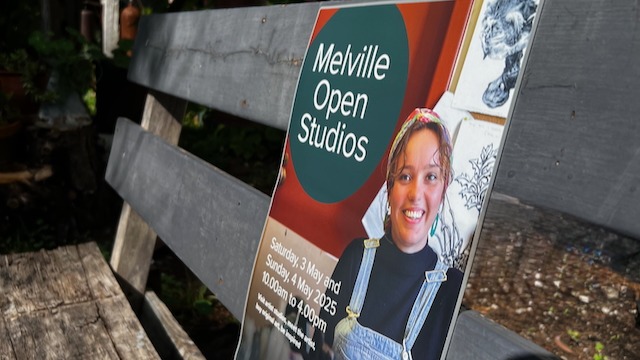 Promotional poster for Melville Open Studios 2025 featuring a local artist on a rustic wooden bench.