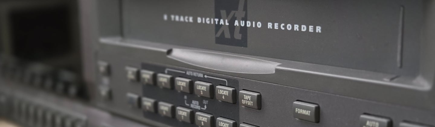 A photo of an 8 track ADAT tape transferring machine.