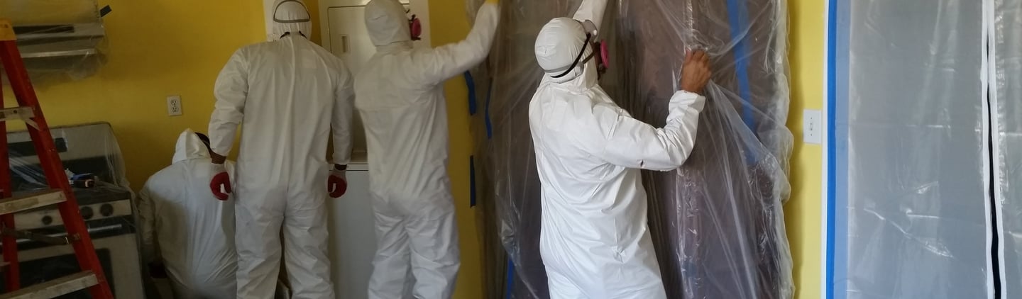 a man in a white suit and a man in a white suit