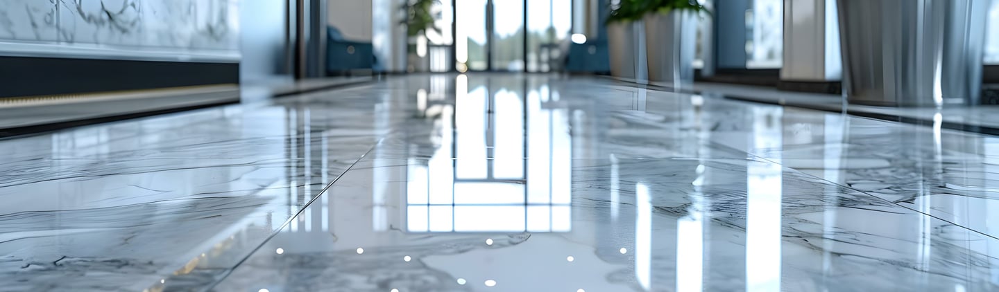 a large marble floor in a hotel lobby