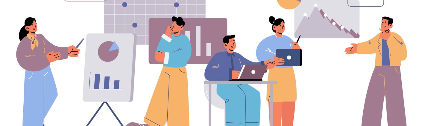 a group of people standing around a table with a laptop showcasing annual reports