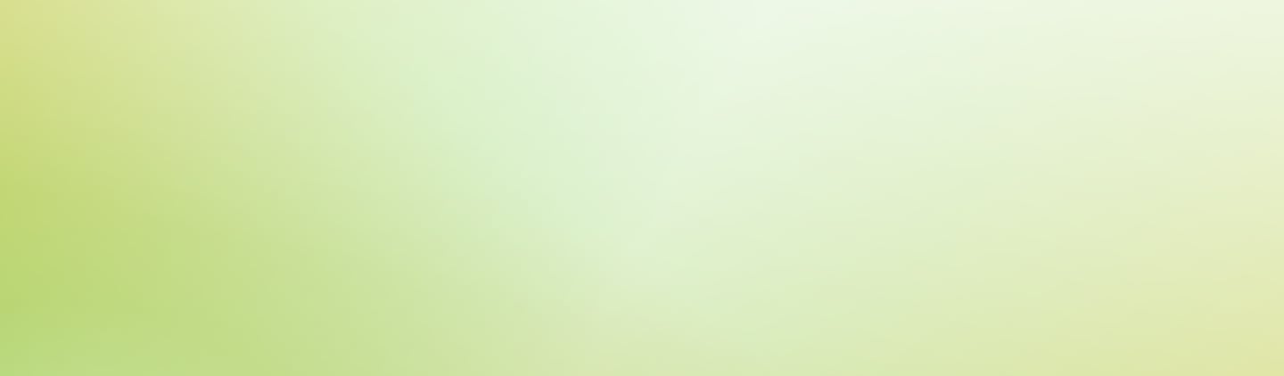 Soft lime green and white abstract gradient background with blurry soft light textures.
