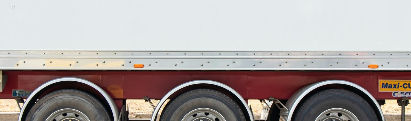 a truck with a trailer behind it