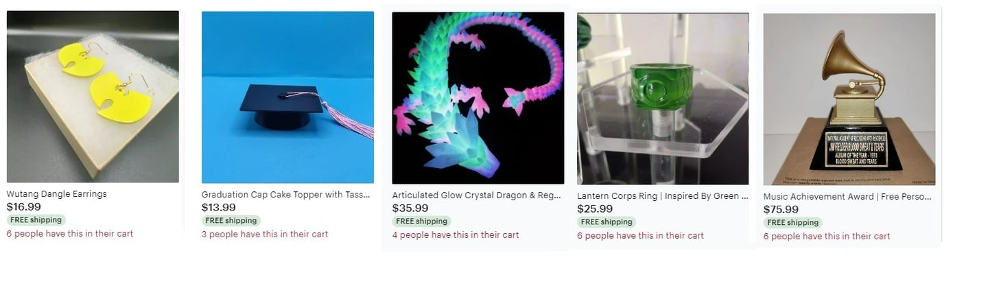 a variety of 3d printed products and gifts for sale on a table
