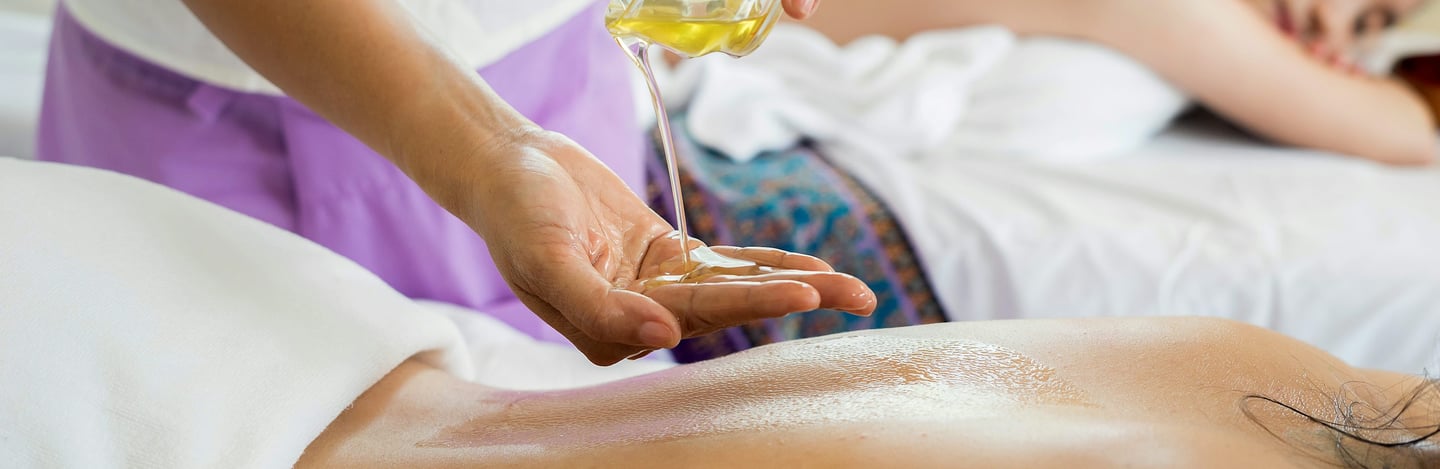 spa massage oil for couples lavender bottle Peace & Pamper Spa