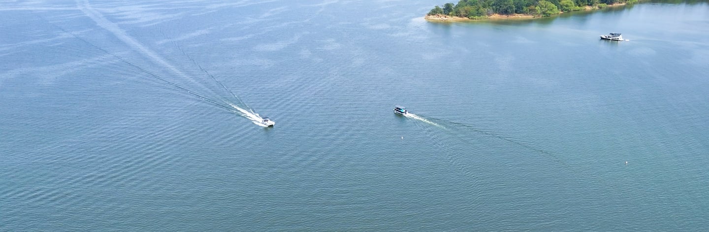 a boat is sailing on the water