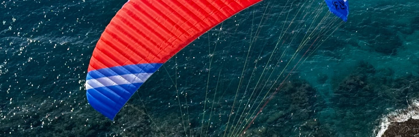  wefly tandem paraglider over sea