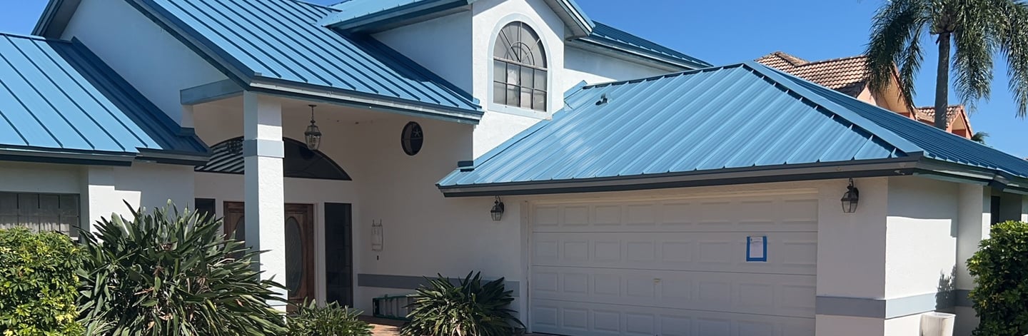 a house with a blue roof and a blue roof