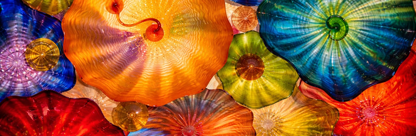 Colorful blown glass objects overlapping like jelly fish