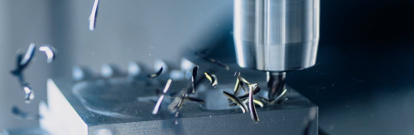 a machine is drilling a hole in a machine