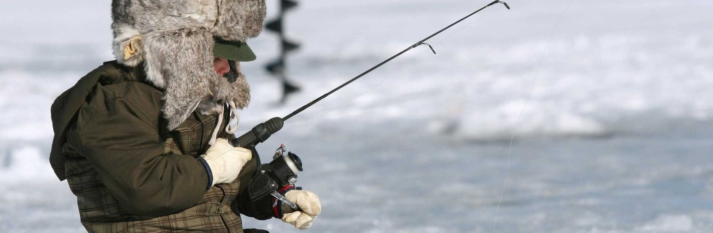 kid fishing in snow