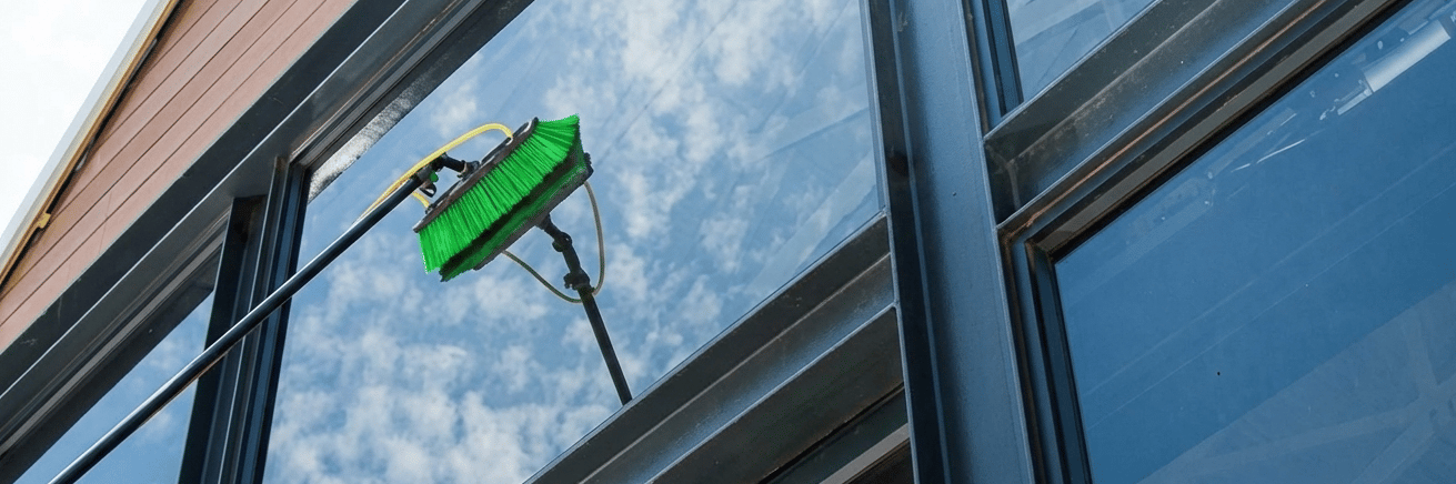 Professional high-rise window cleaning by TOT Cleaning & Landscape Sdn Bhd.