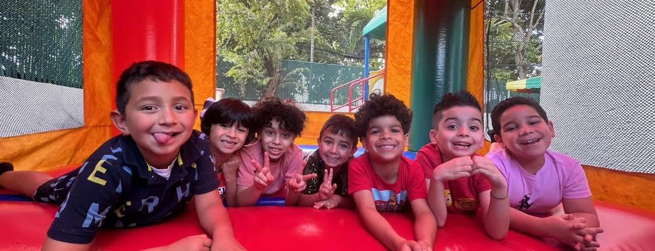 a group of children in a bouncer FANTASTIC LAND LEARNING CENTER