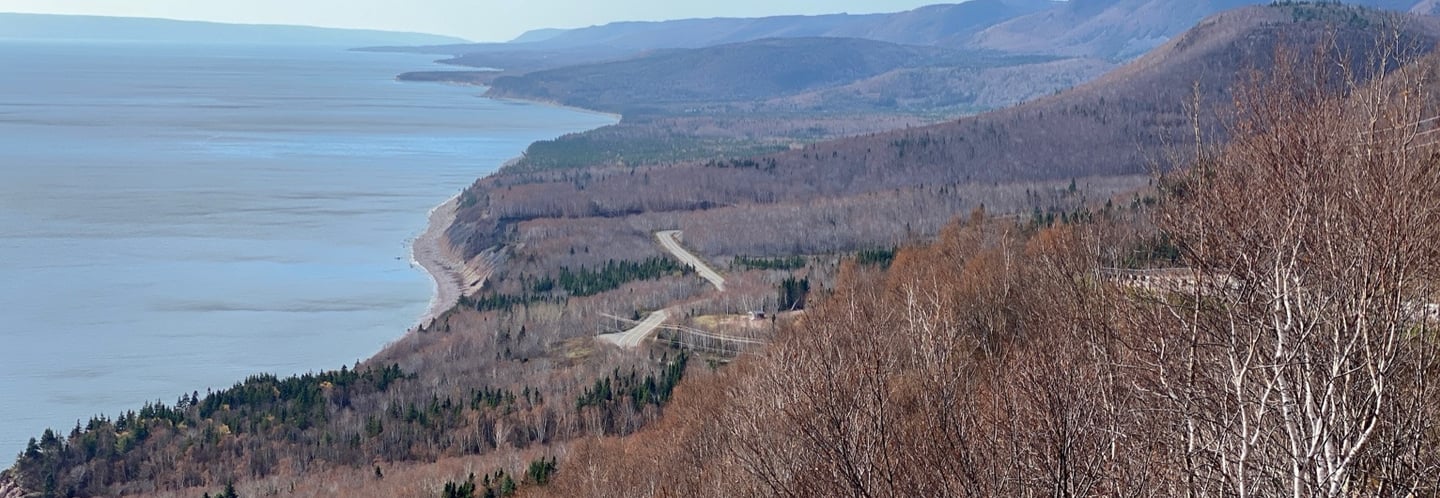 winding road with mountain on side