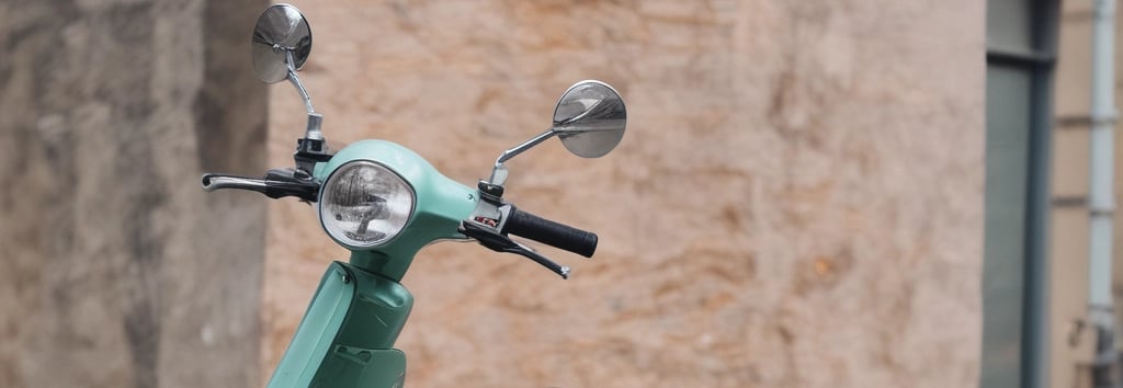 A friendly customer service agent holding a phone with a WhatsApp chat screen open, ready to assist with scooter rentals.