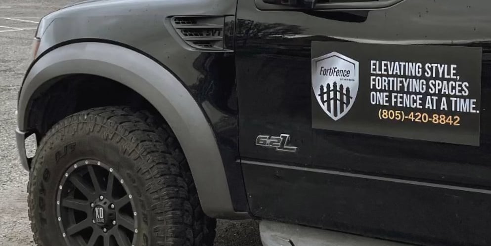 Company truck with fortifence logo.
