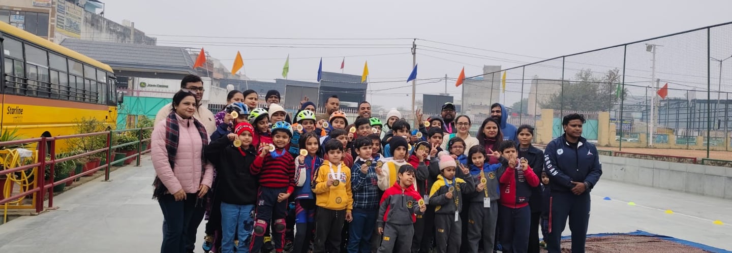 Young school students wearing roller skates and holding medals at a sports competition outdoors.