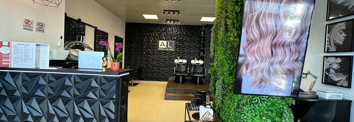 a salon and spa with a green wall