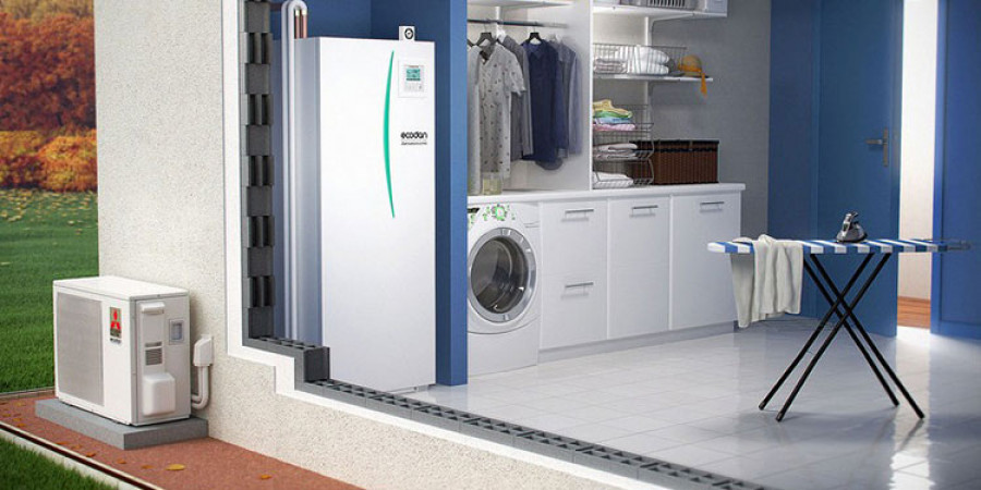 a laundry room with a washing machine and a laundry room