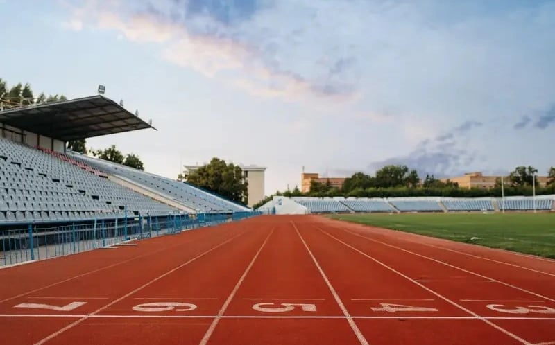 a stadium with a track and a stadium