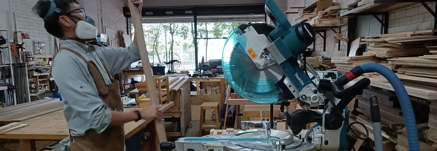 Method of using a mitre saw