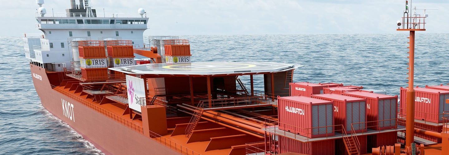 a large cargo ship with containers on the deck