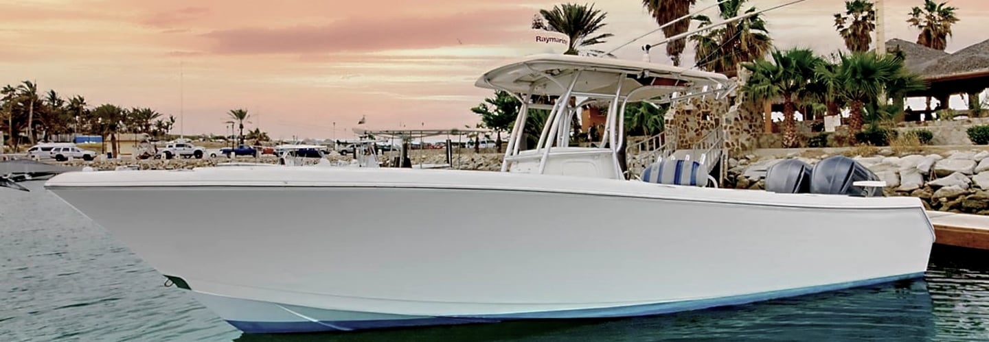 a center console boat in a marina