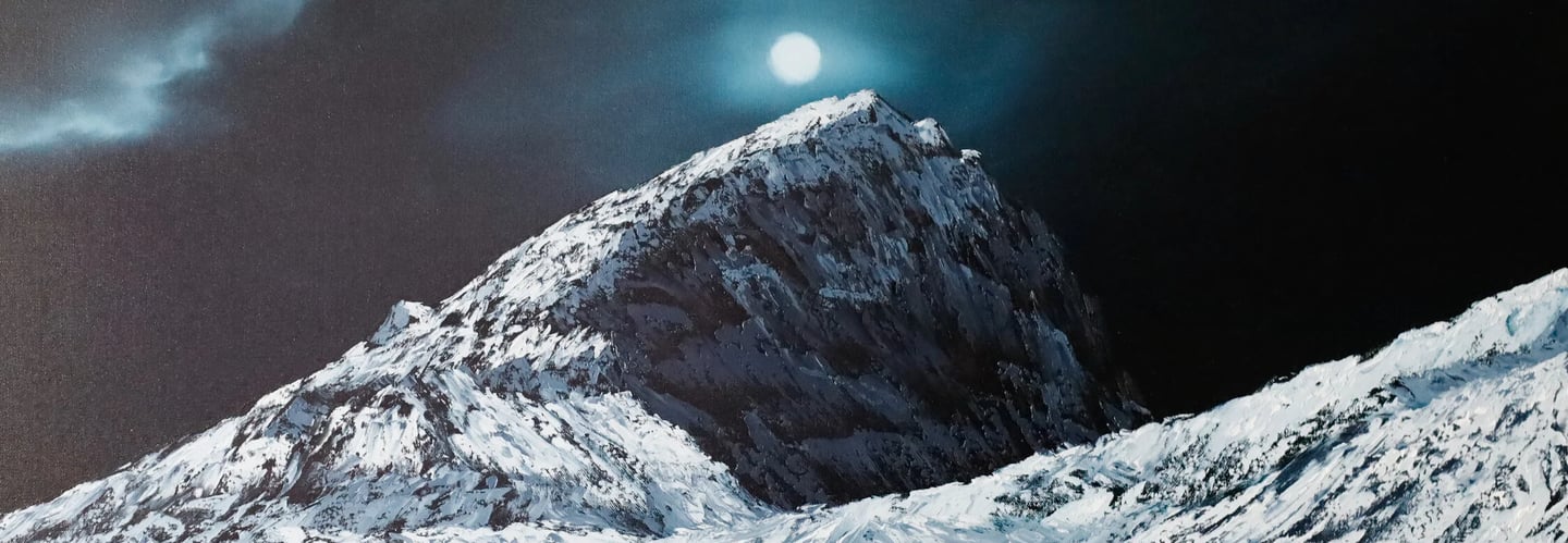 a mountain scene with a moon and a full moon