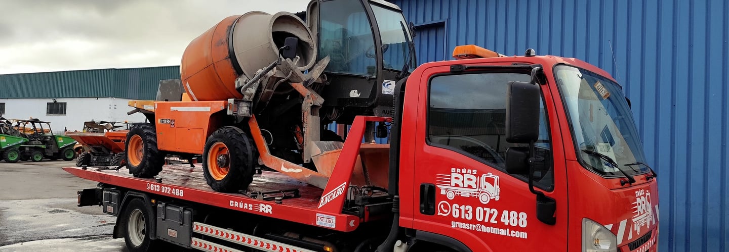 a cement mixer truck with a cement mixer on it