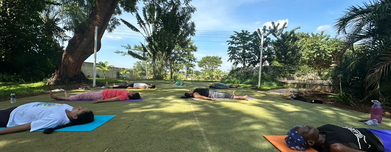 Savasana or corpus posture with Yoga participants for relaxation. 