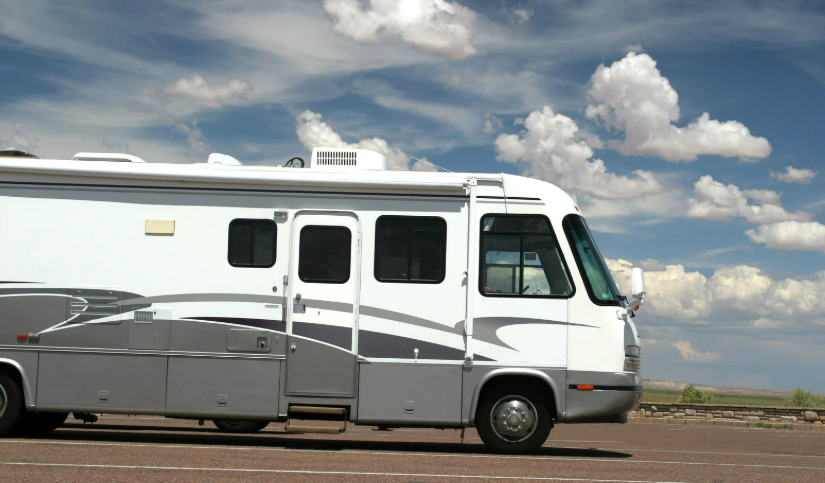 a motorhome rv parked in a parking lot