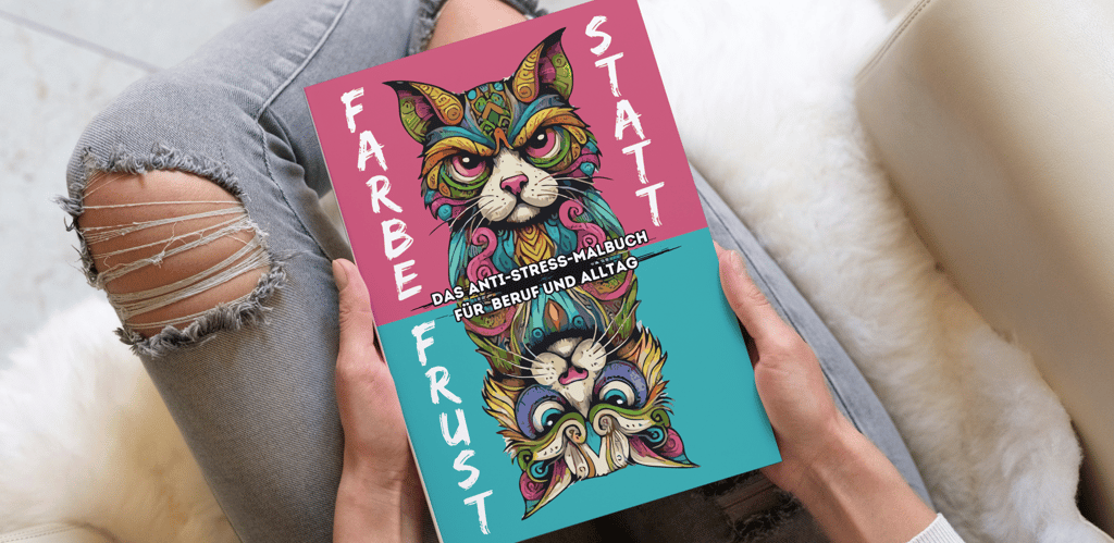 a person sitting on a couch with a book about a cat