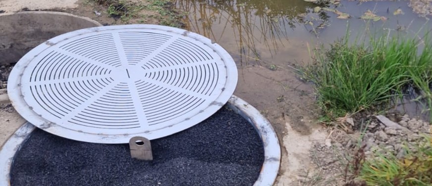 A picture of biochar filtering farm run off
