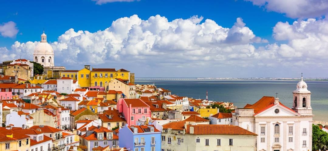 a view of a city with a view of the ocean