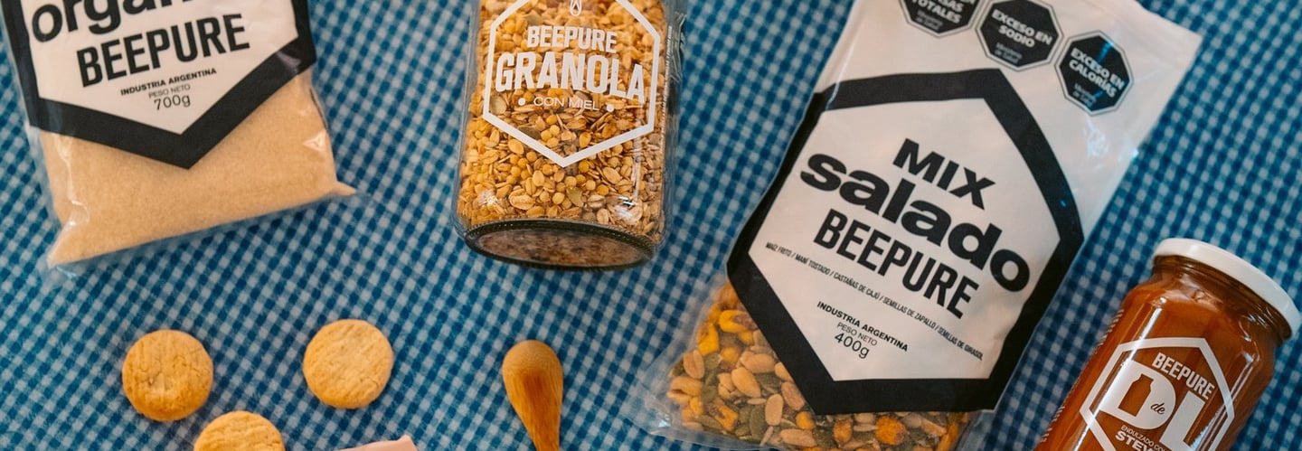 Portfolio BEEPURE distribuido por Vanzzini Chile: granola, mix salado, azúcar orgánica, cookies y dulce de leche