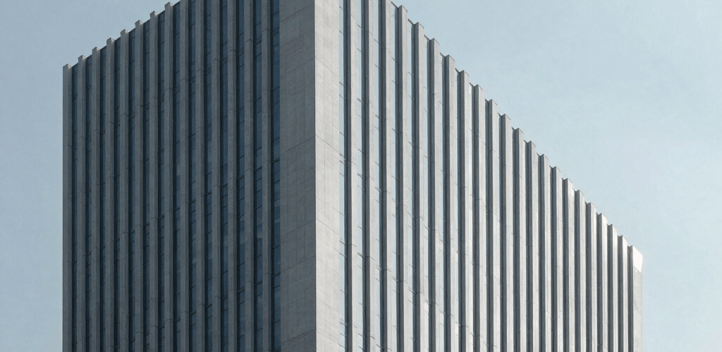 A professional consultant discussing contract details with a client in a modern office setting.