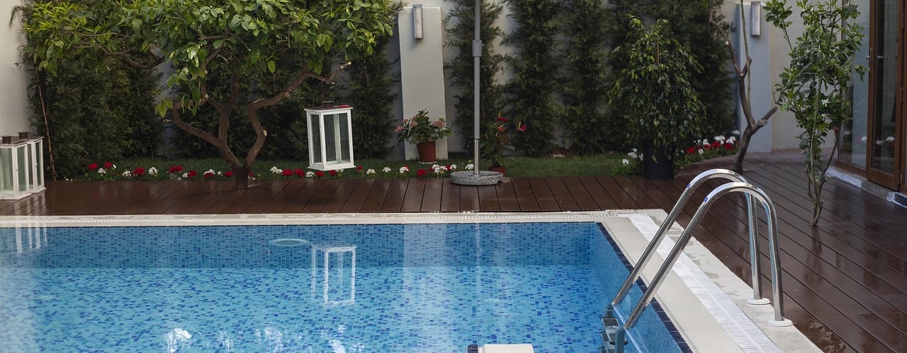 Beautiful clean pool with wooden surround