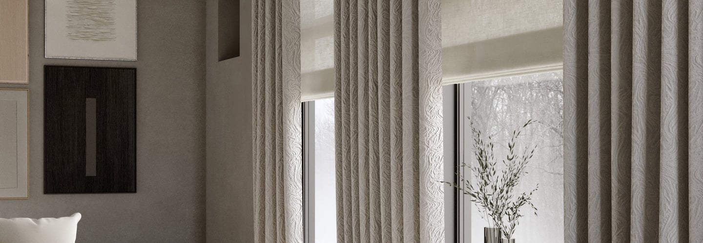 Style and elegance are achieved with wave curtains and Roman blinds.