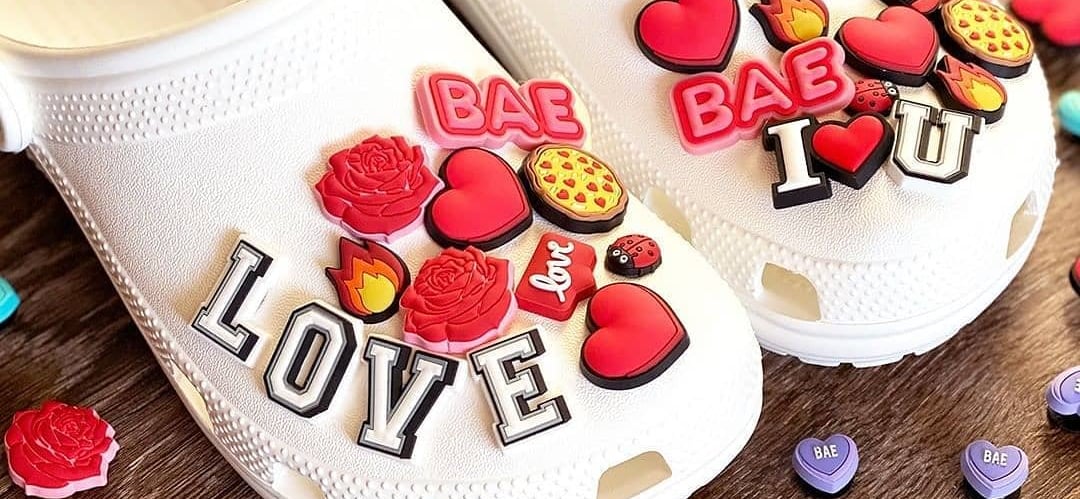 A colorful display of various shoe charms installed on crocs