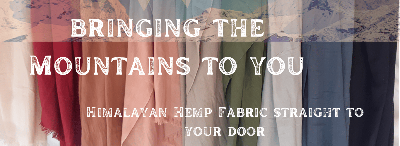 colourful hemp sarongs hanging with himalayan mountain background