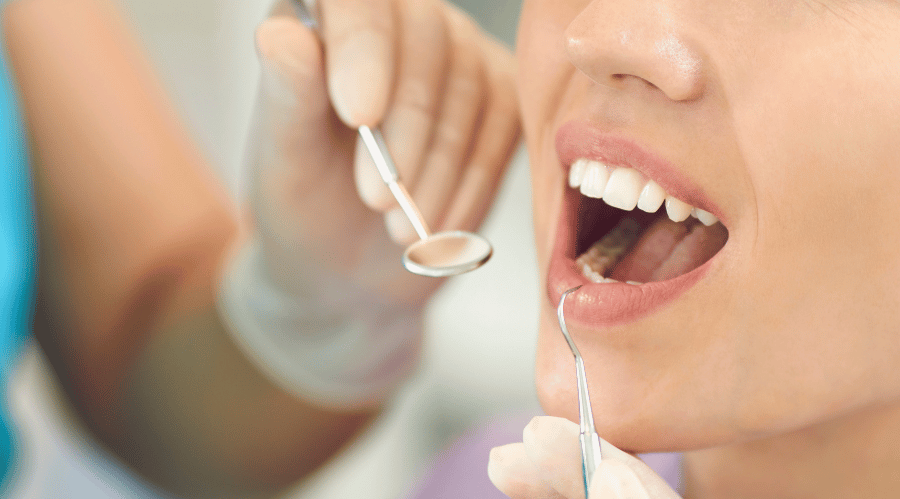 An experienced dentist in Greater Noida performing professional dental care, ensuring healthy teeth 