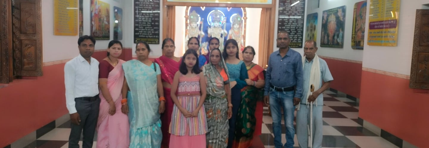 Family group photo in Katghora temple