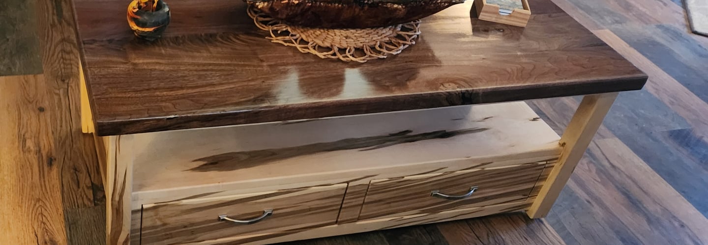 Walnut and ambrosia maple coffee table. Assembled with sliding dovetails.