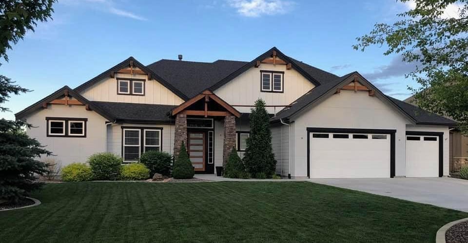 Beautiful brown and tan home exterior painting in Boise Idaho by Golden Hands Painting