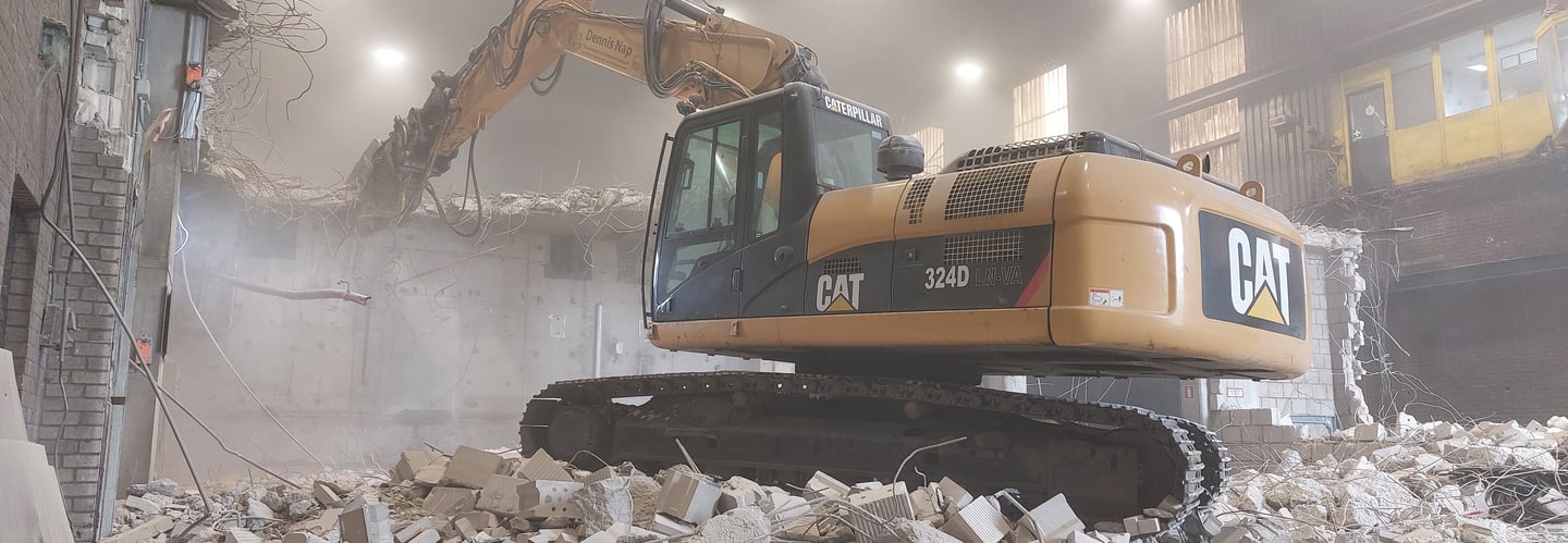 sloopwerkzaamheden beton knipper met vergruizer