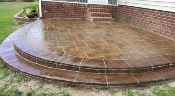 a patio with a brick patio with a brick patio
