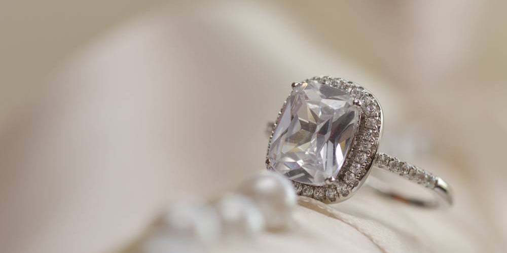 a ring with a CVD diamond ring and a pearl ring