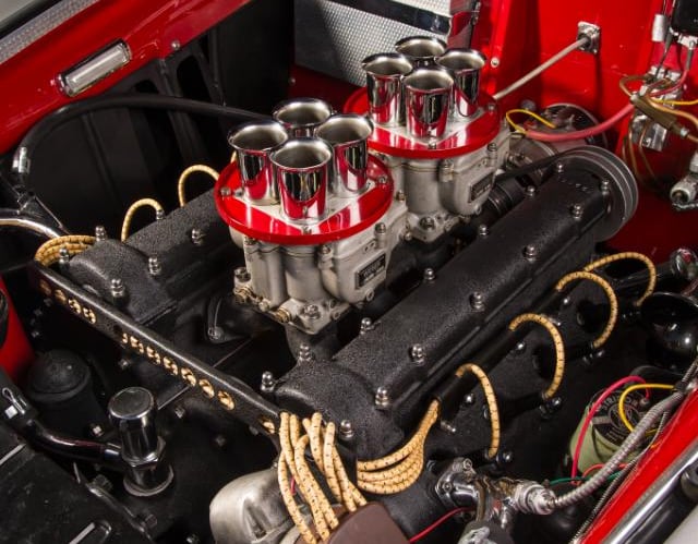 a car engine with a red engine and a red engine